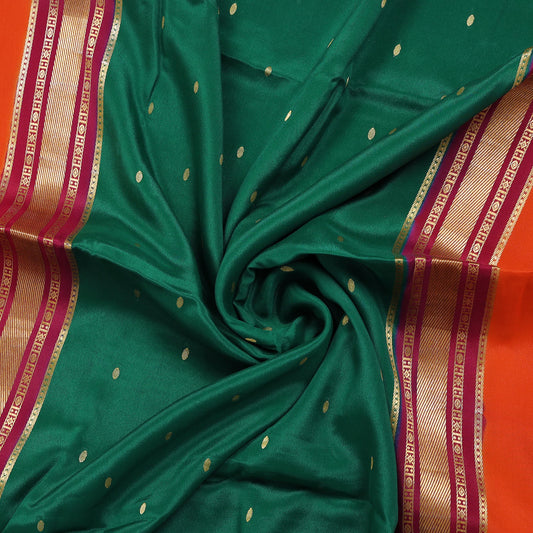 Emerald green and orange Mysore crepe pure silk saree with elegant finish