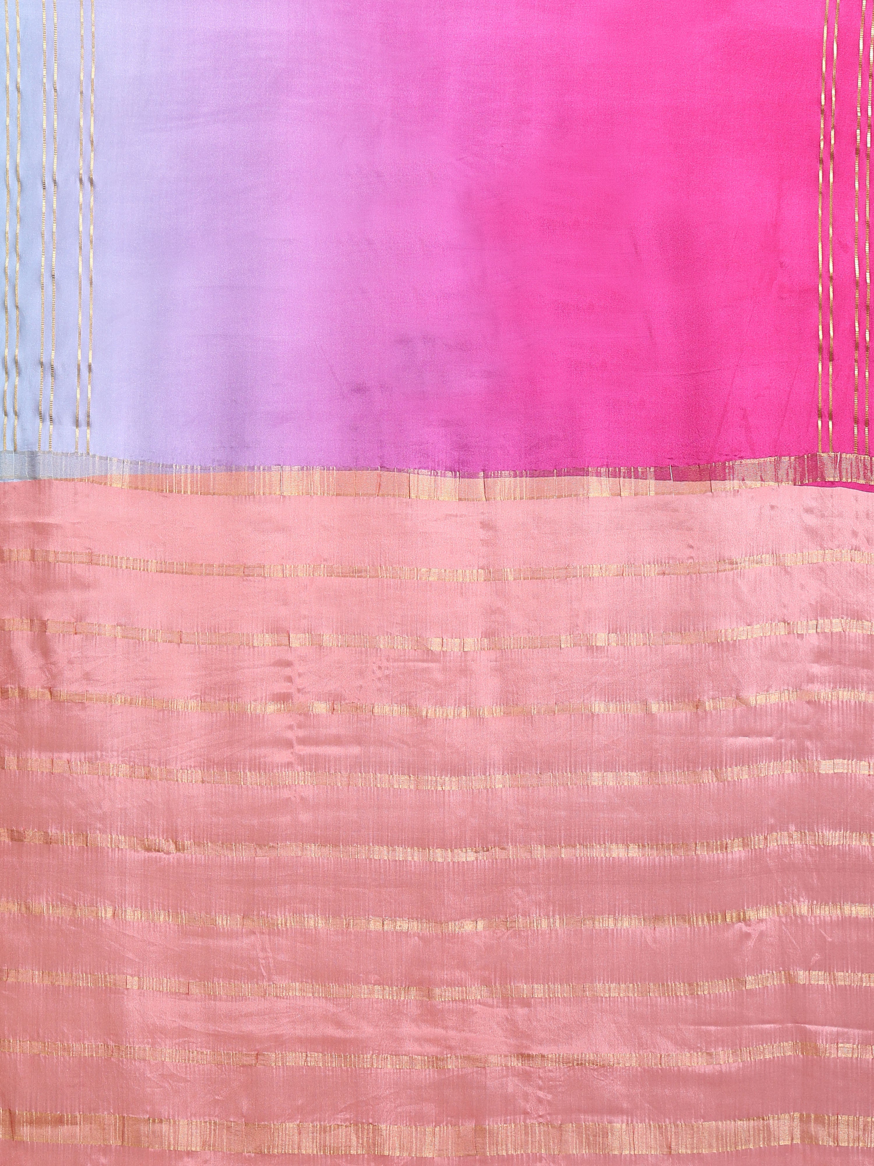 Close up of peach pallu with dense horizontal gold zari rectangular dash motifs and colour-block body panels