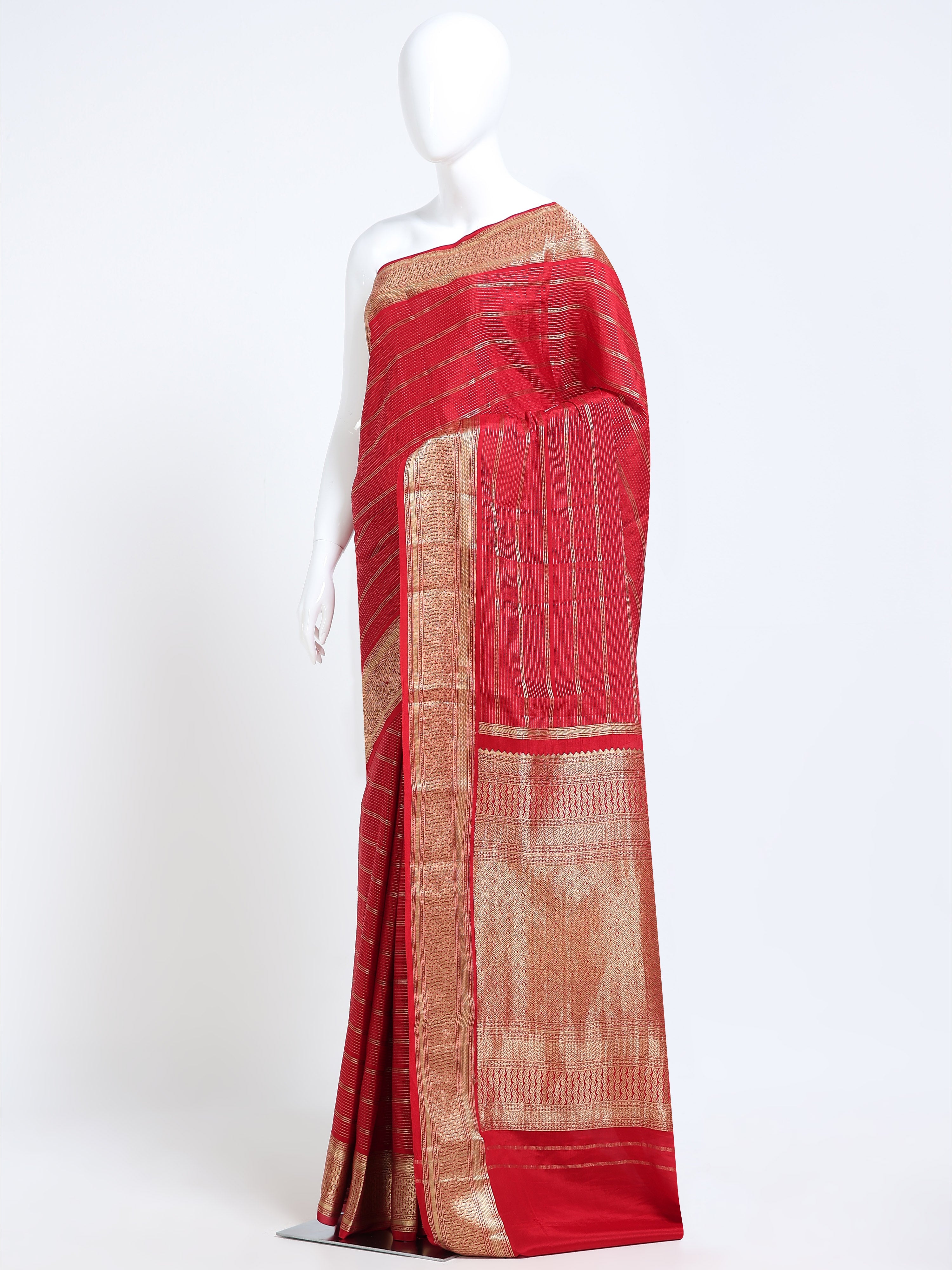 Coral Red Mysore Crepe Pure Silk Saree with heavily woven gold jaal pallu - mannequin side view