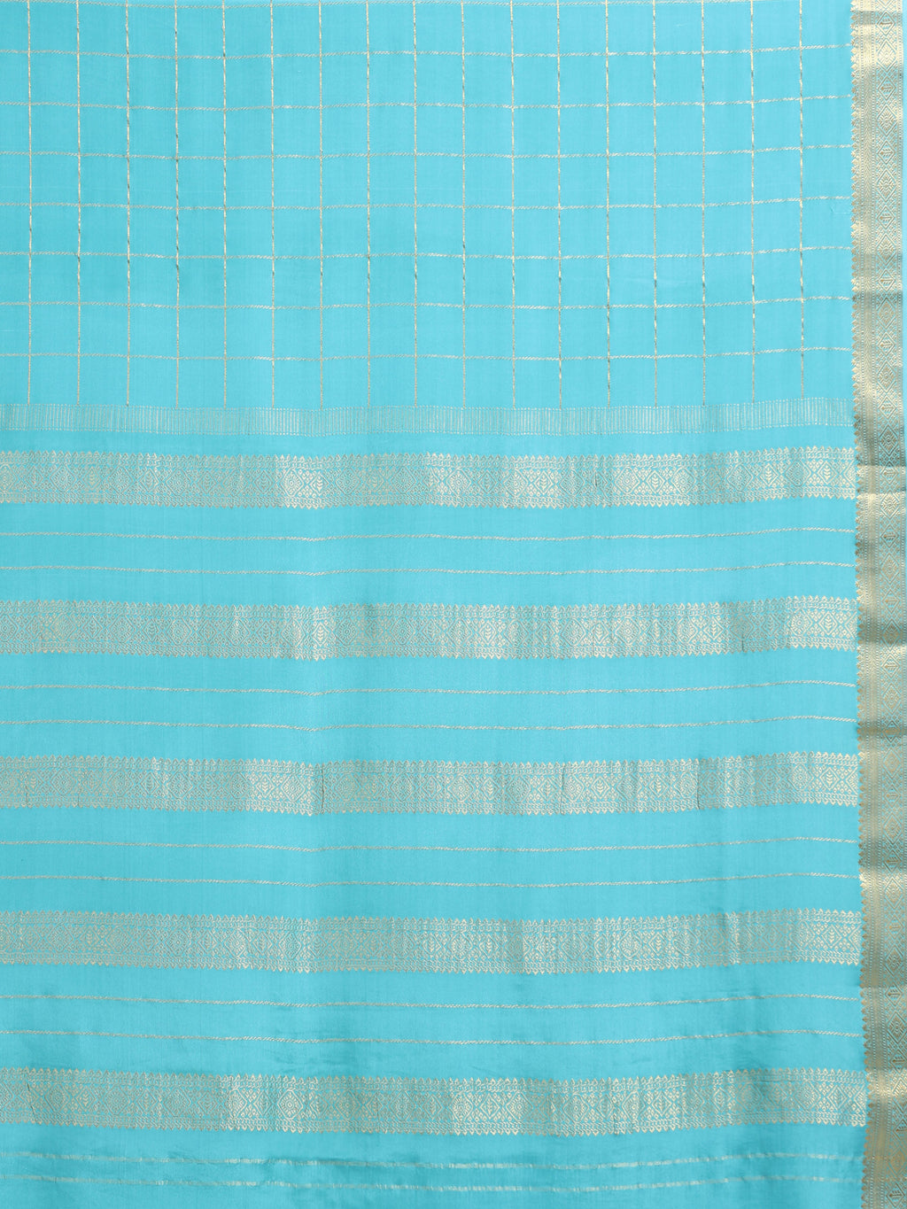 Close up of turquoise body with large gold zari check grid and alternating gold zari geometric floral stripe pallu bands