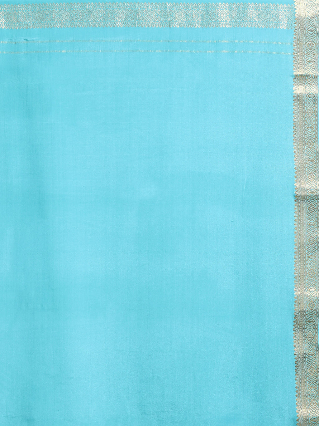 Close up of plain turquoise silk body with narrow silver gold zari diamond motif border