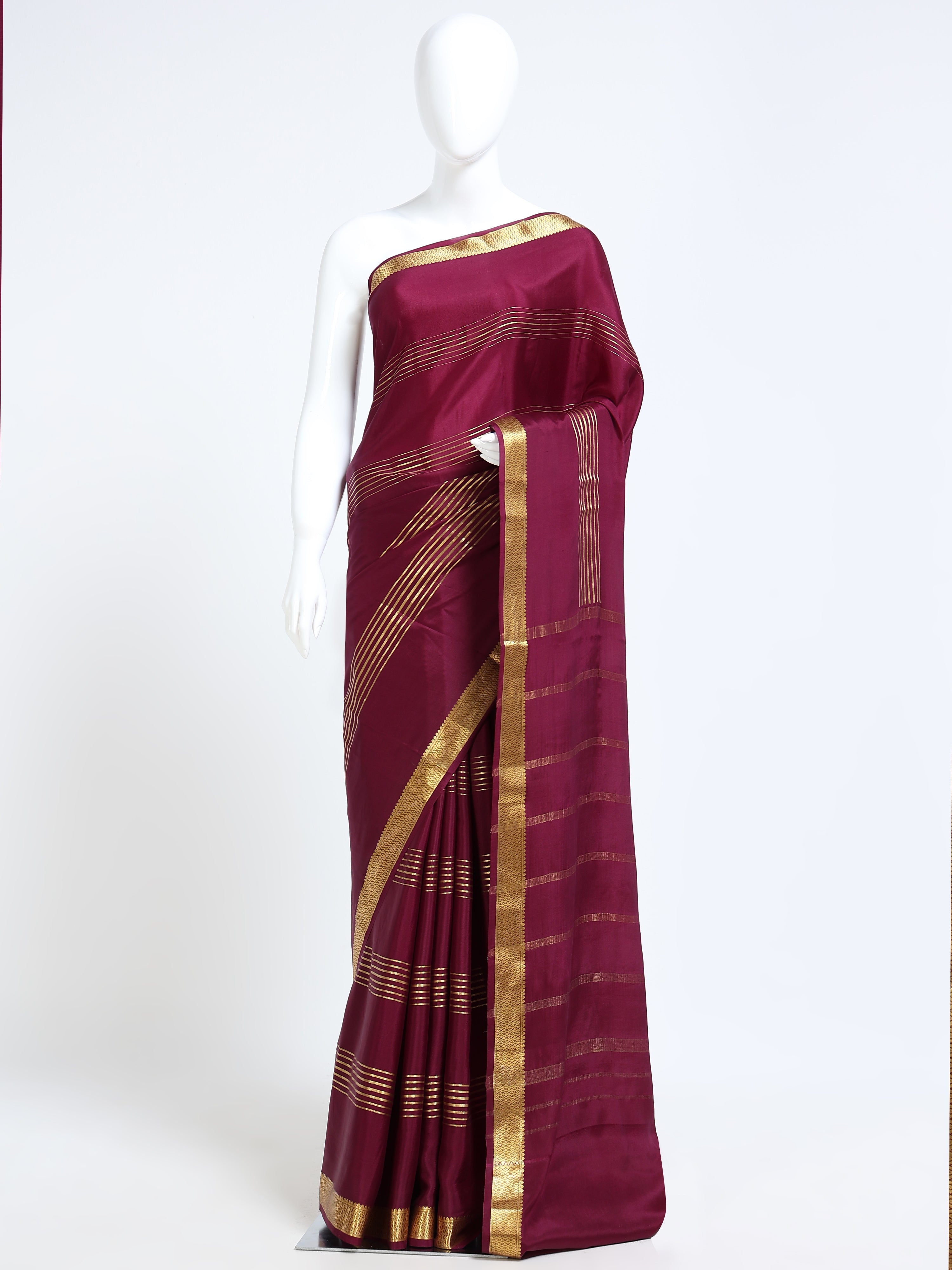 Burgundy Mysore Crepe Pure Silk Saree with gold zari clustered stripe body and wide diamond border - mannequin front view