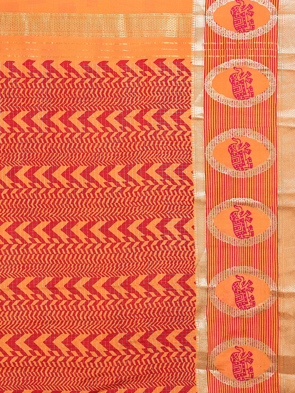 Close up of dense red chevron zigzag arrow pallu pattern and large oval elephant deity medallion border on gold zari stripe ground