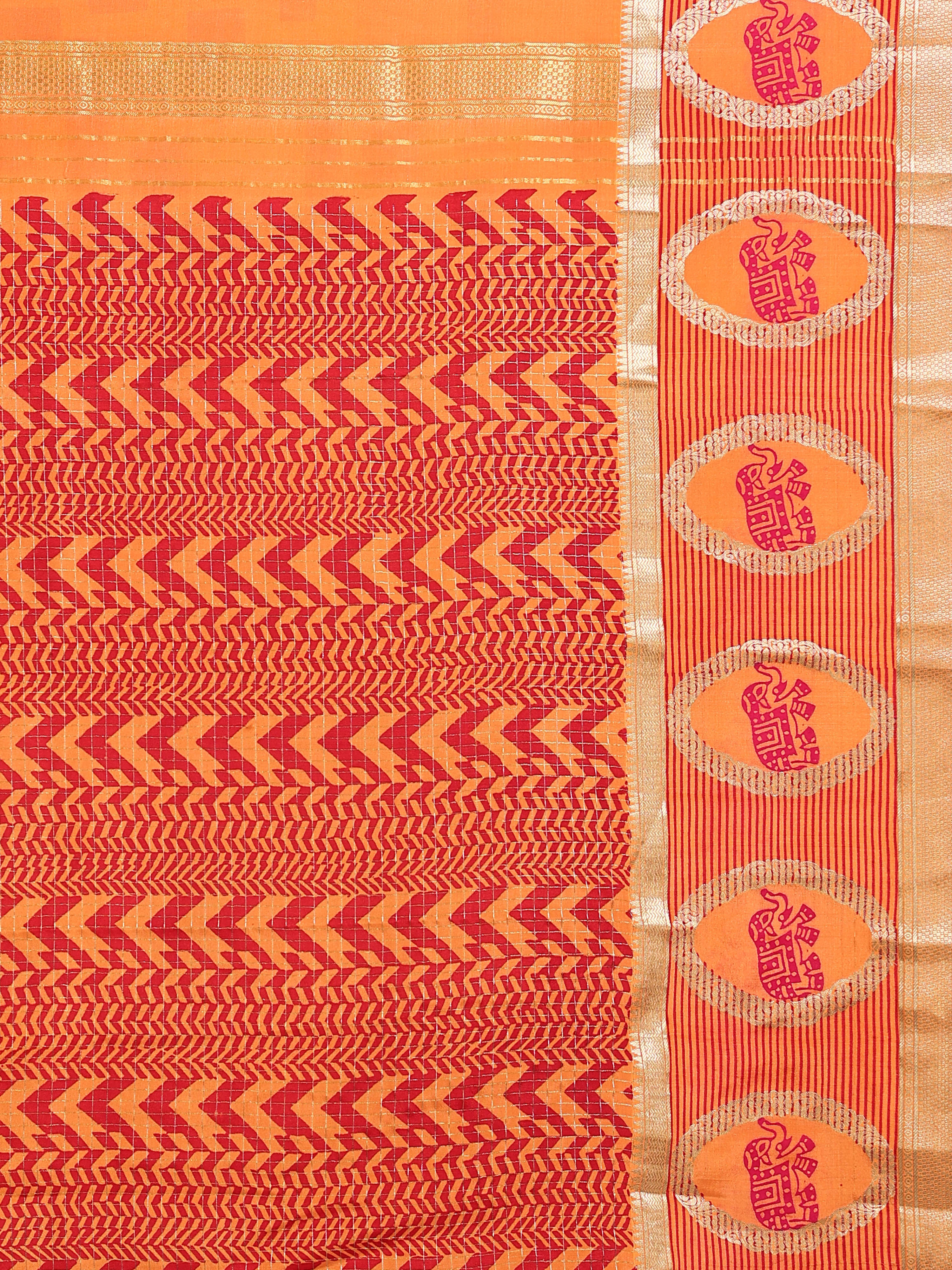 Close up of dense red chevron zigzag arrow pallu pattern and large oval elephant deity medallion border on gold zari stripe ground