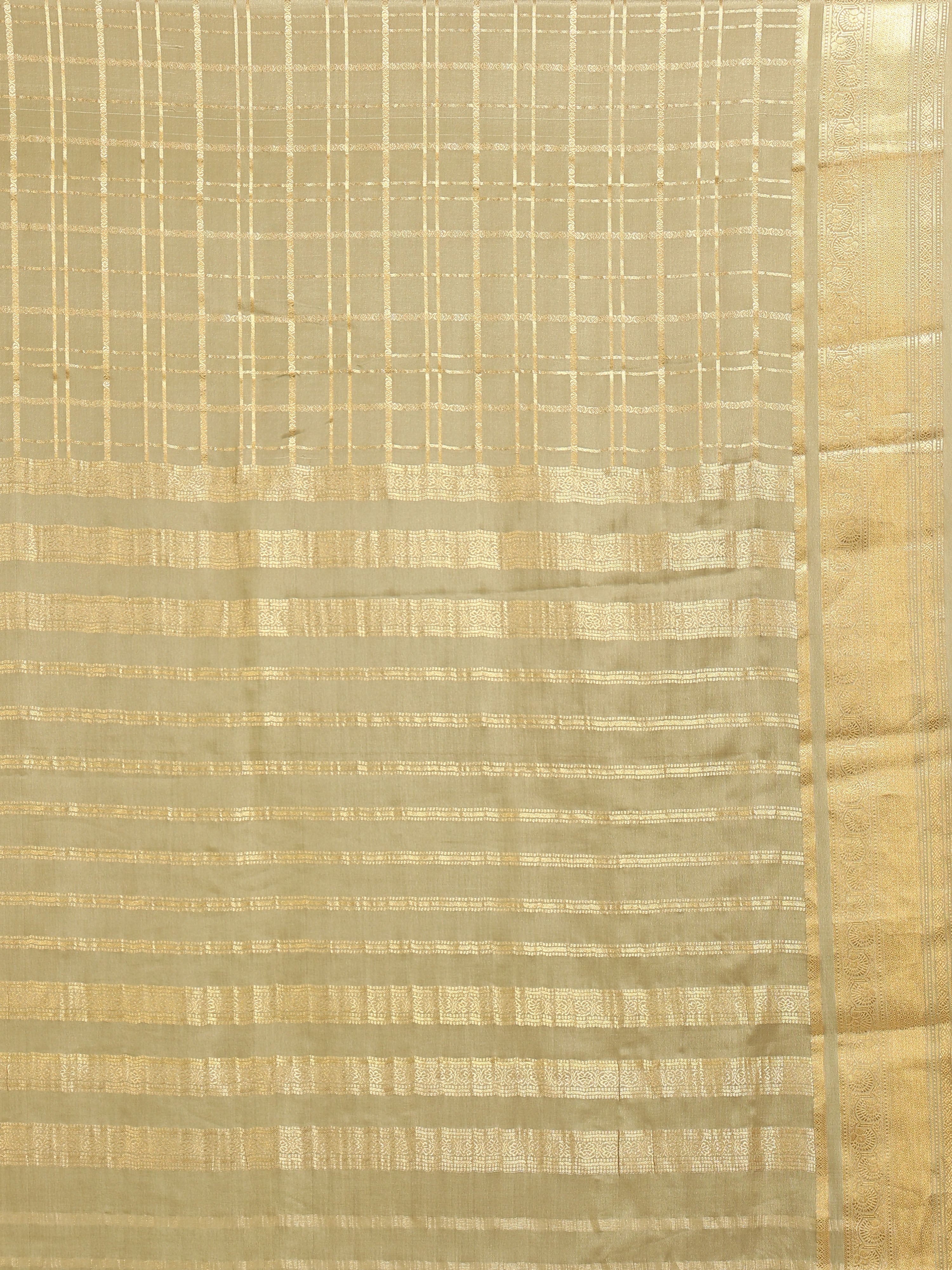 Close up of champagne gold body with large self-tone gold zari check grid and horizontal gold zari block stripe pallu bands