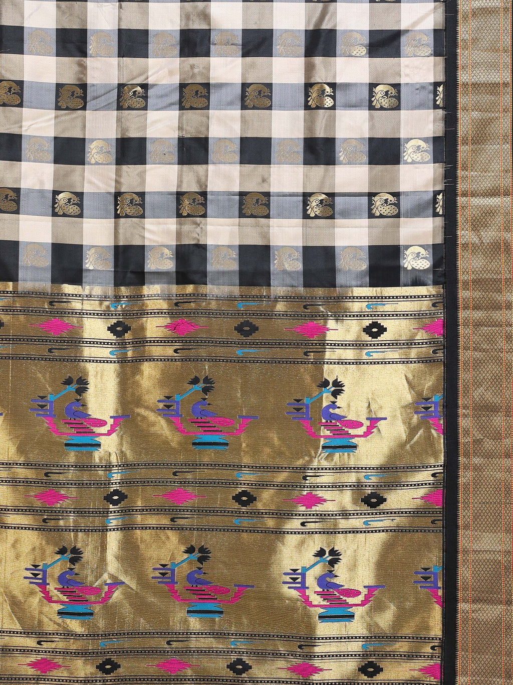 Close up of bold black cream gingham check body with gold zari peacock buttas and multicolour Paithani peacock pallu