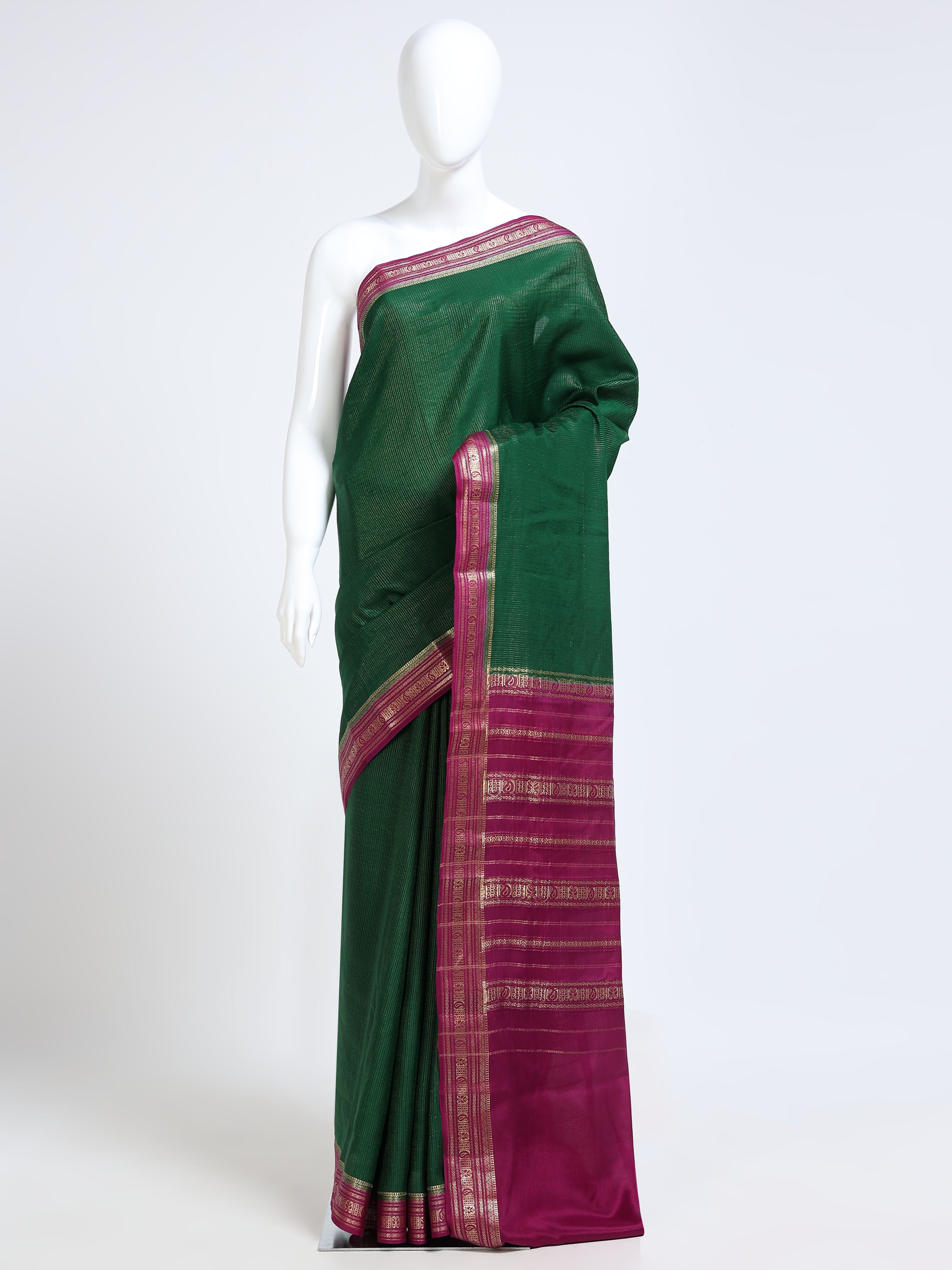 Bottle Green Mysore Crepe Pure Silk Saree with gold zari stripe body and contrast magenta peacock pallu - mannequin front view