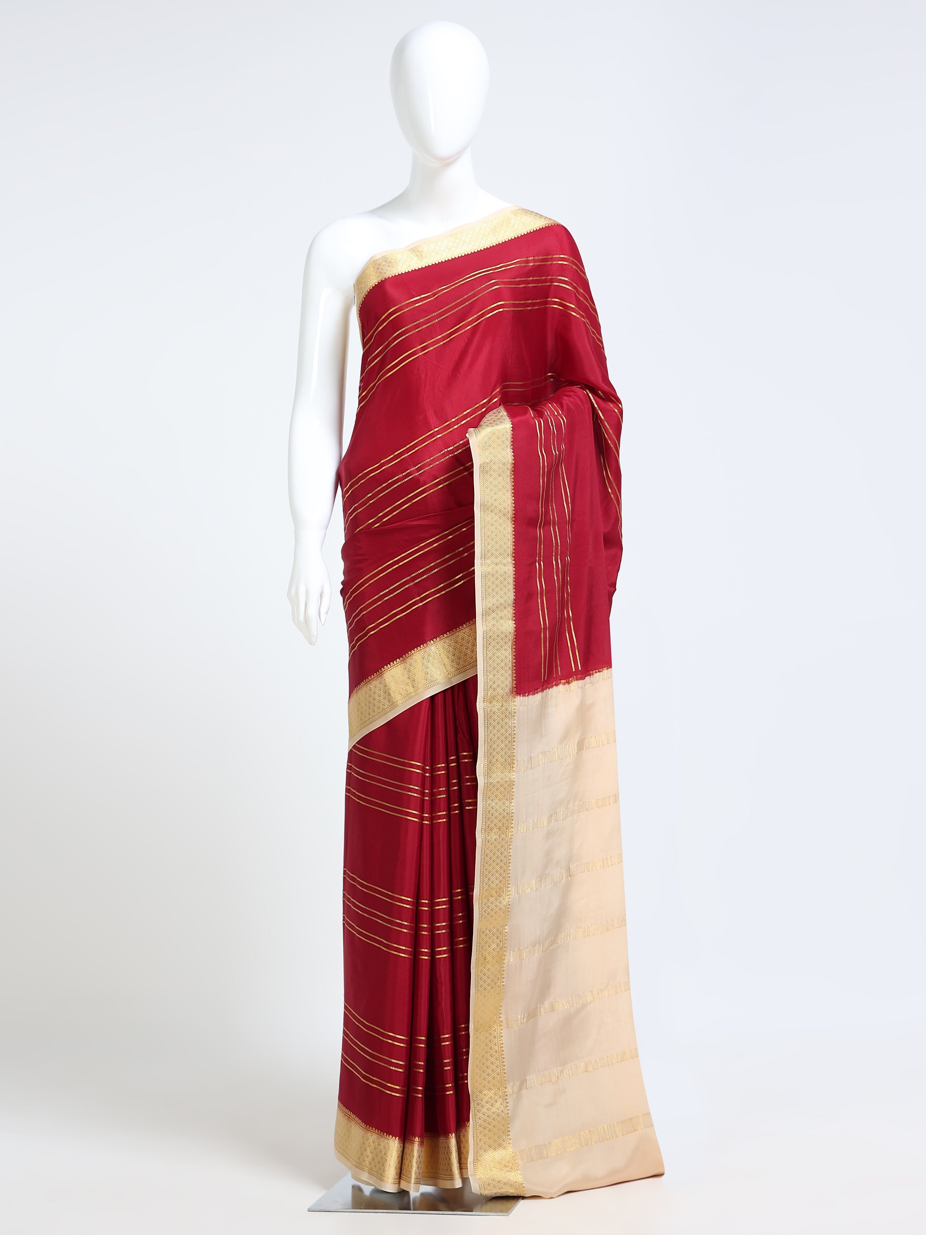 Crimson Red Mysore Crepe Pure Silk Saree with gold zari stripe body and contrast cream diamond lattice border pallu - mannequin front view