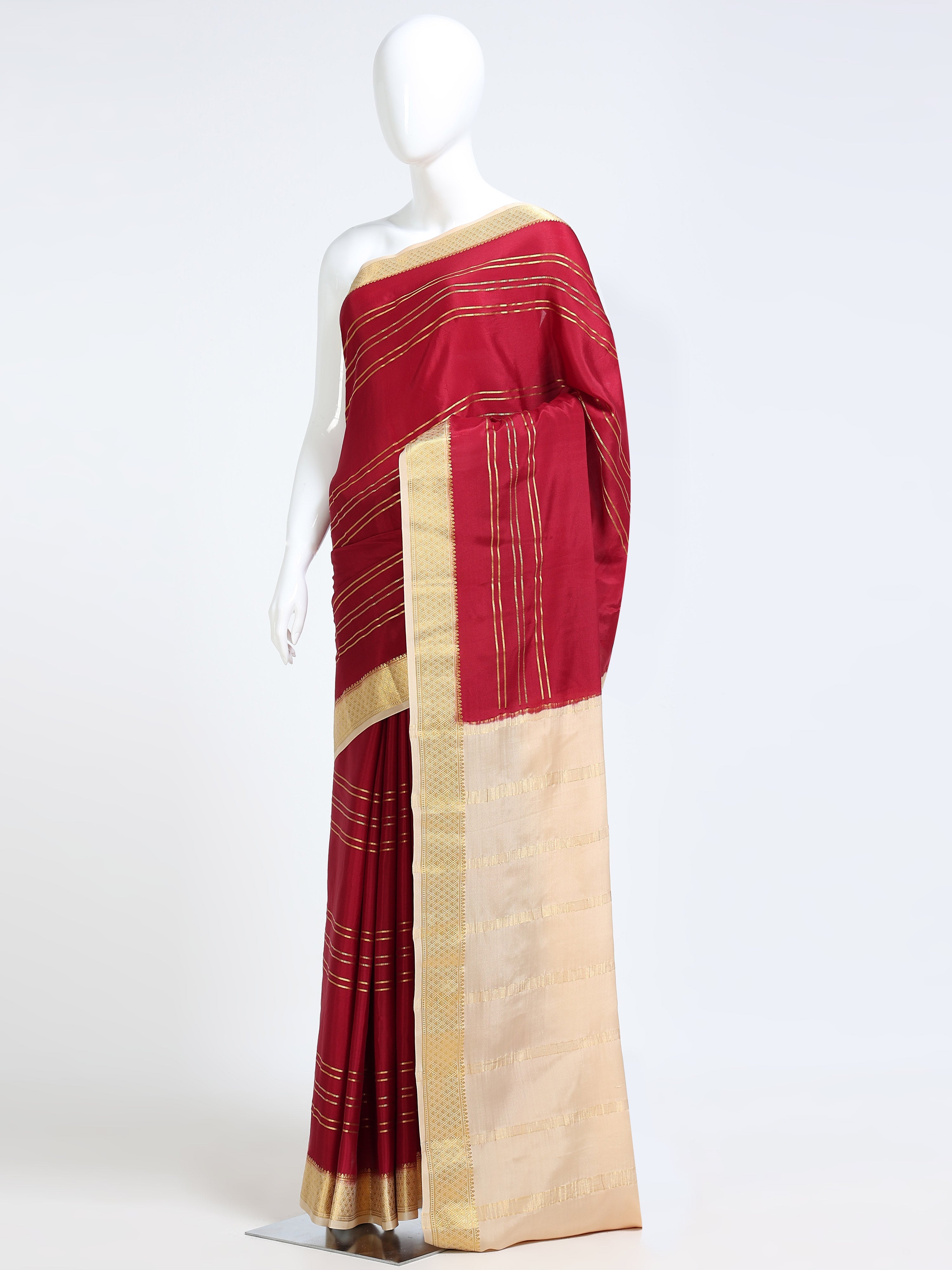 Crimson Red Mysore Crepe Pure Silk Saree with contrast cream pallu and wide gold zari diamond lattice border - mannequin side view