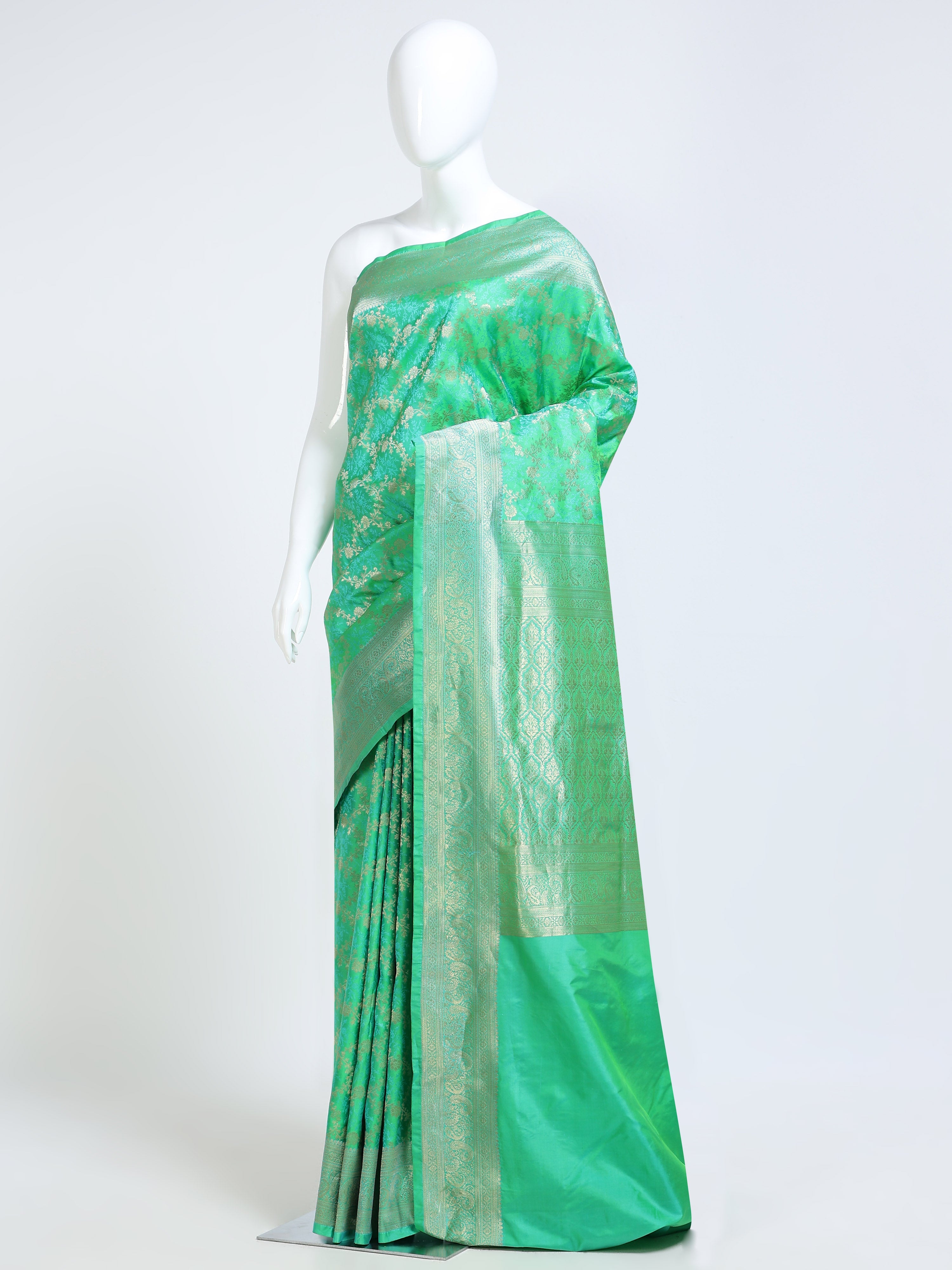 Mint Green Kanchipuram Pure Silk Saree with all-over silver zari floral vine jaal body and ogee lattice pallu - mannequin side view