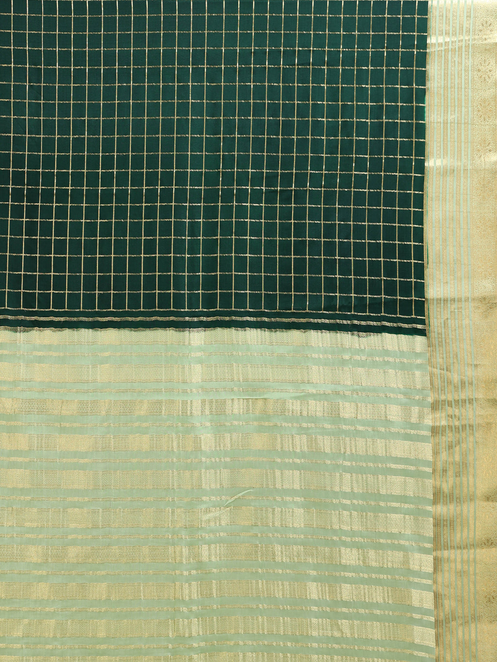 Close up of deep bottle green body with large two-tone gold silver zari check grid and soft mint pallu with dense horizontal gold zari stripe bands