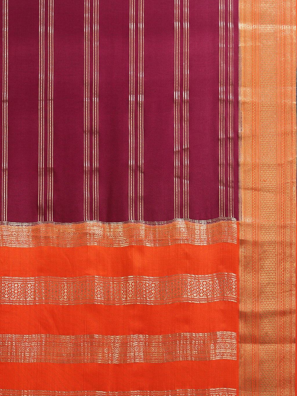 Close up of wine body with vertical gold zari stripes and orange zari pallu bands