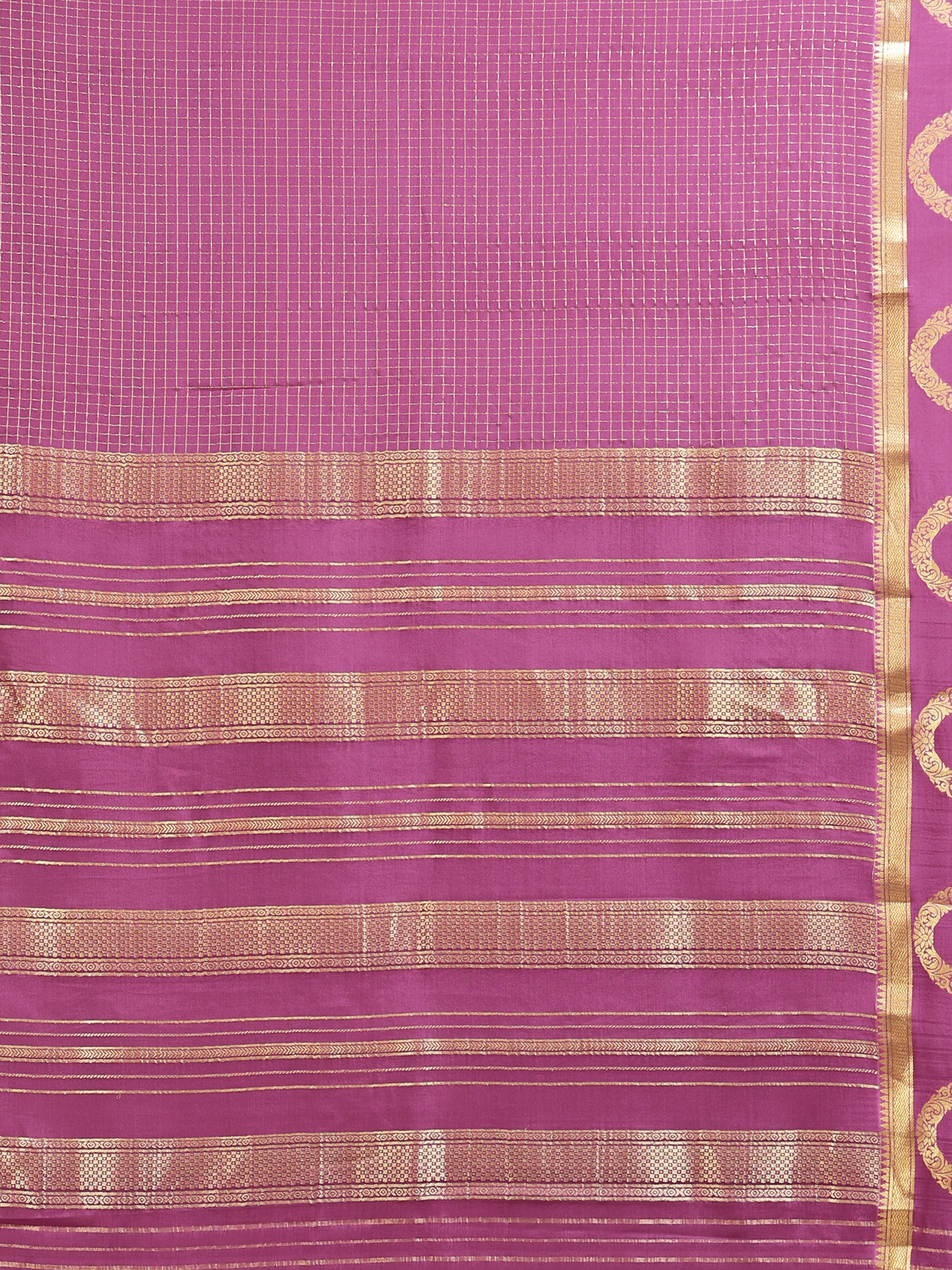 Close up of mauve body with fine gold zari check grid and horizontal stripe pallu bands
